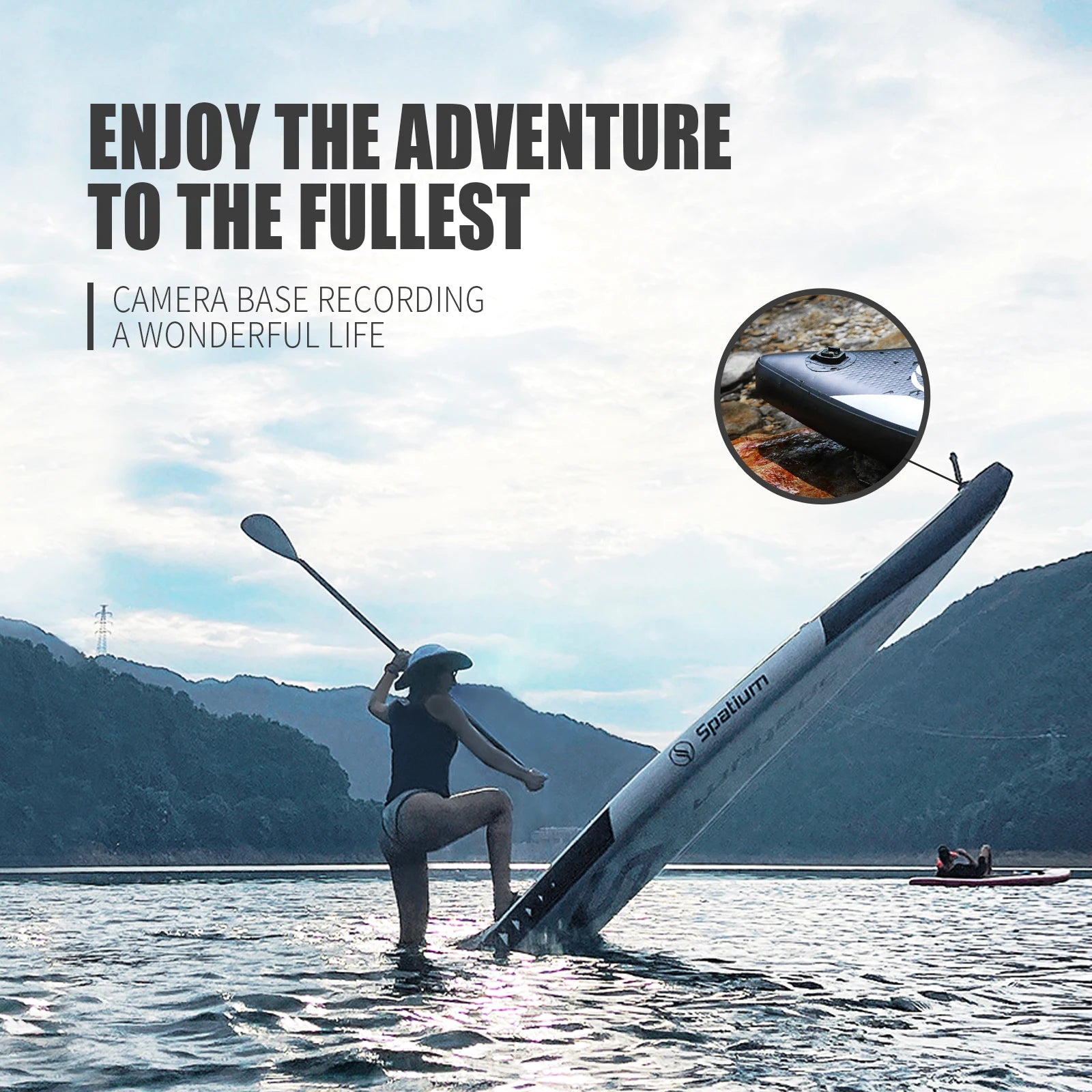 A person in a hat stands on the Spatium Premium Paddle Board in a mountain lake, holding a paddle. Text reads, Enjoy the adventure to the fullest. Inset image shows a close-up of the camera base.